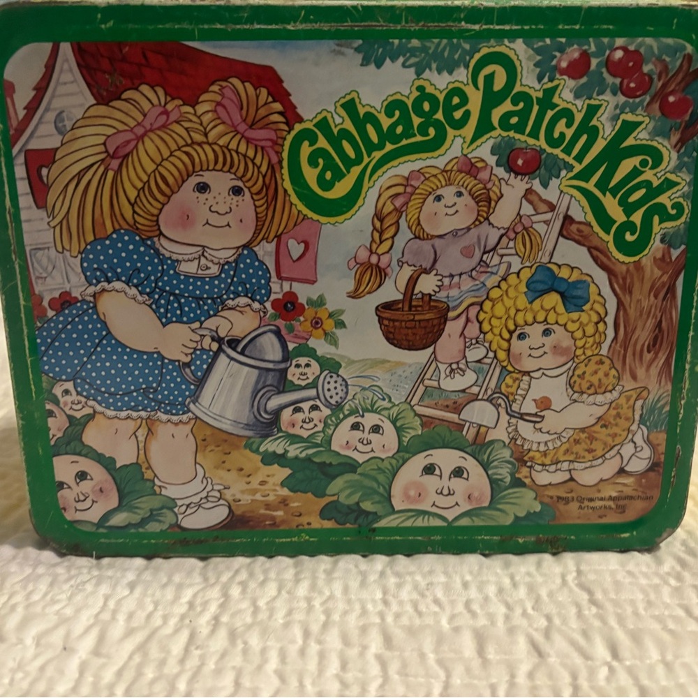 Green and yellow, tin lunch box.